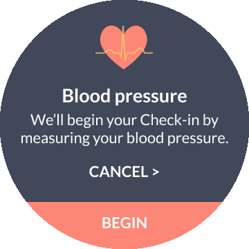 Smartwatch blood pressure measurement screen with heart icon and begin button